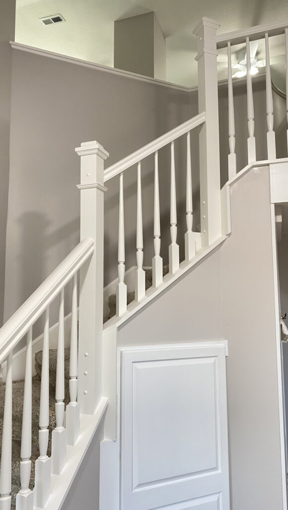 Staircase with white paint finish by Franc Painting in Akron, Ohio