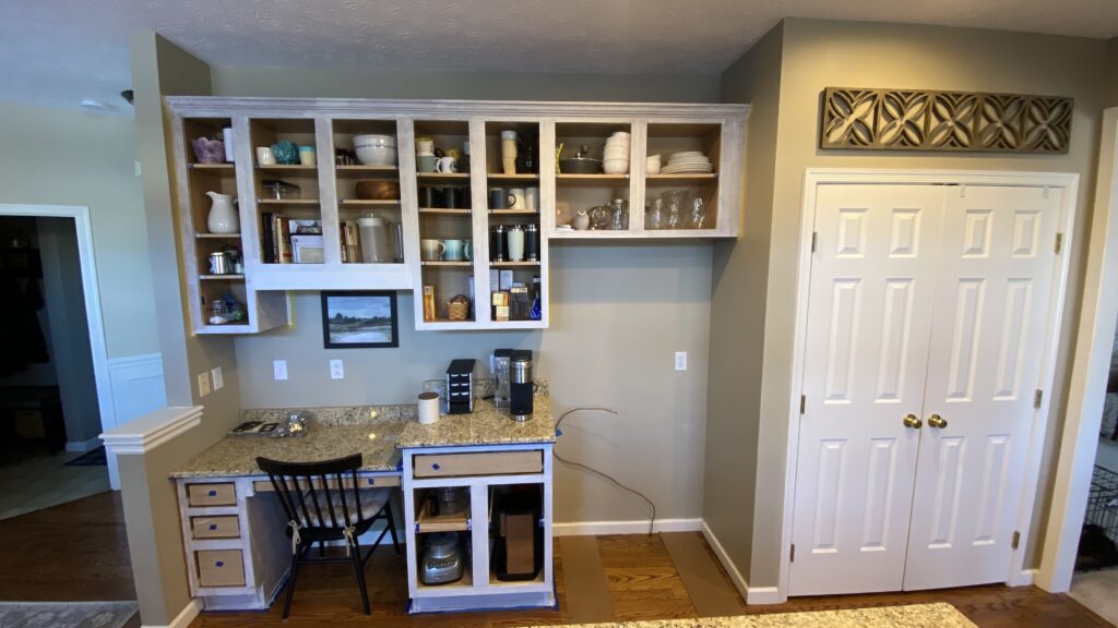 Open shelving kitchen with painted walls by Franc Painting in Akron, Ohio.