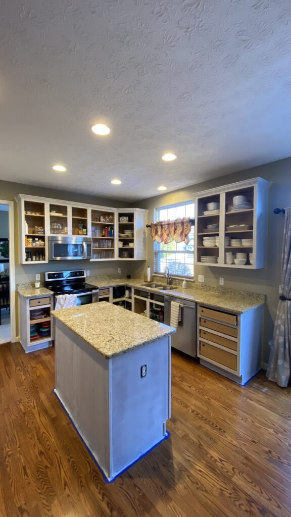 Kitchen in progress with painted cabinets by Franc Painting in Akron, Ohio.
