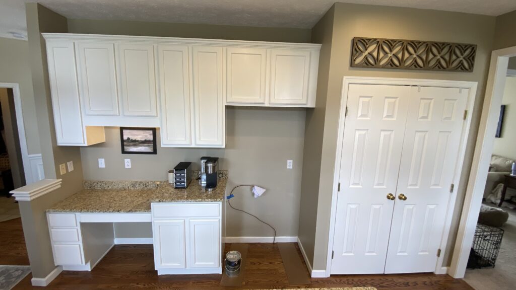 Custom painted white kitchen cabinets by Franc Painting in Akron, Ohio.