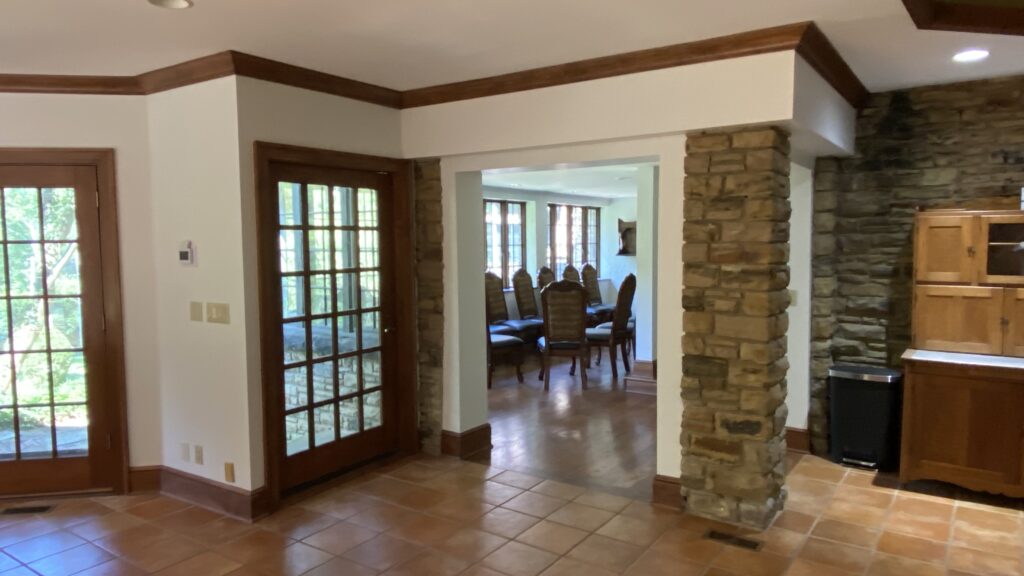 Entryway with stone and wood accents, painted by Franc Painting in Akron, Ohio.